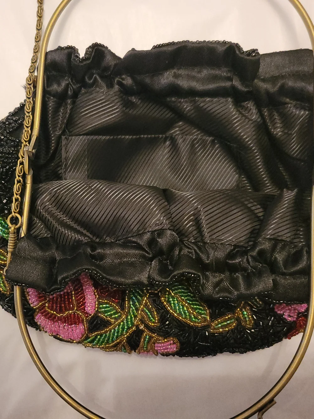Vintage-inspired Black Beaded Floral Handbag with Gold Handle